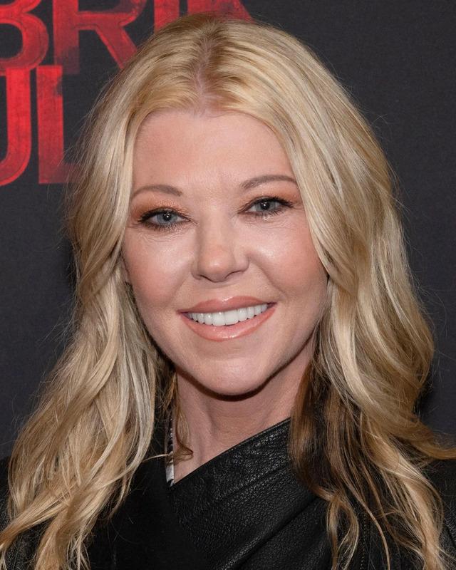Tara Reid at the "Pabrik Gula" premiere with a radiant smile.